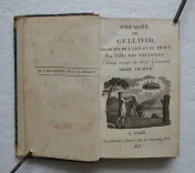 Voyages de Gulliver, traduits de l’anglais, de Swift, par l’abbé Des Fontaines.
Édition ornée de douze gravures. - photo